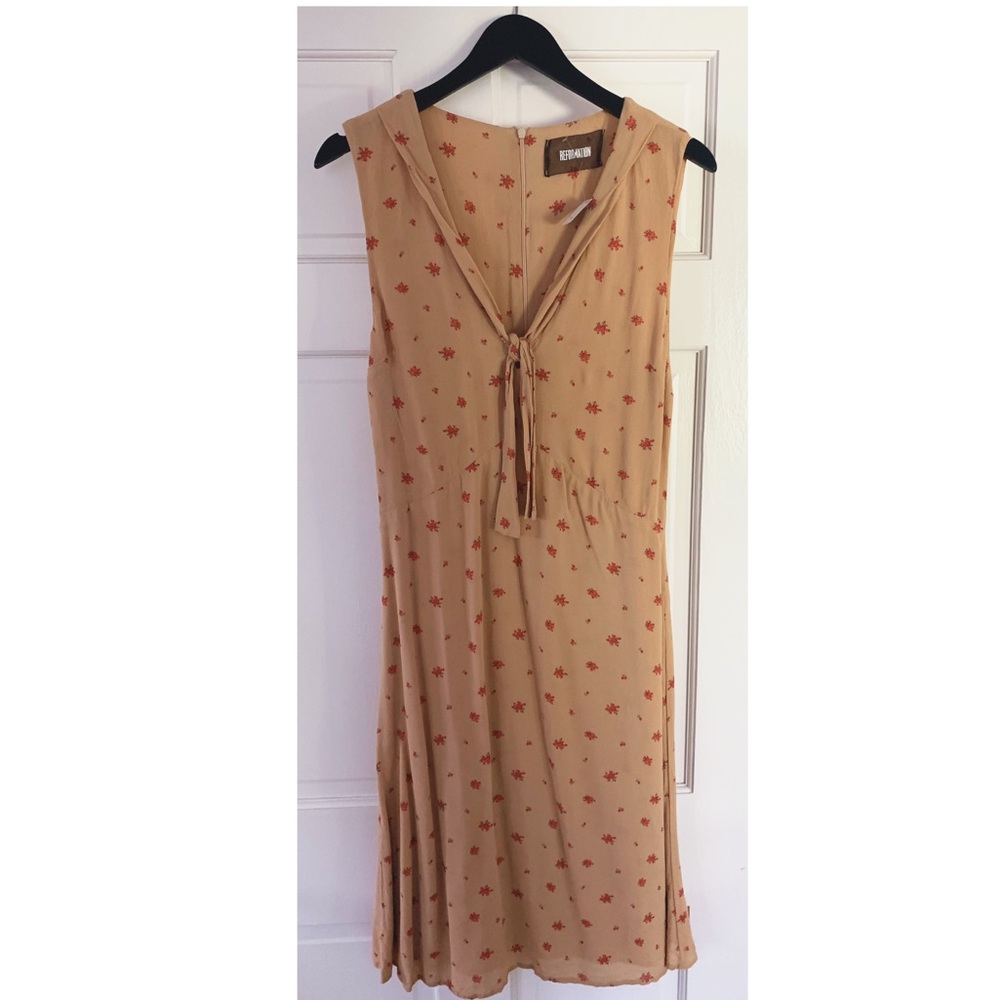 Midi length floral dress with tie by Reformation